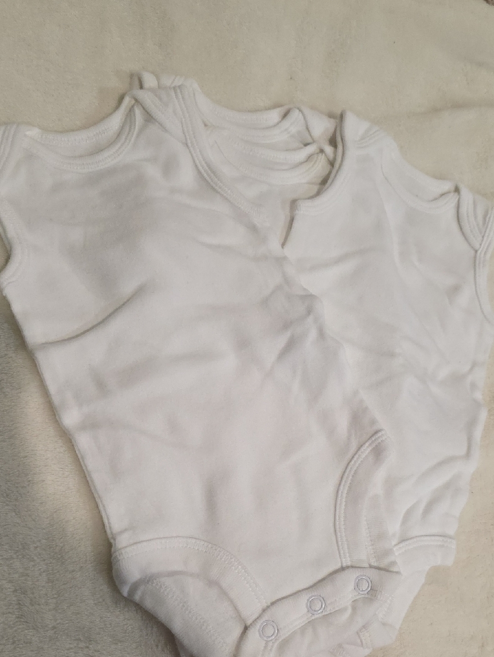 Carter's White Infant Cotton One-Piece Bodysuits - Set of 4